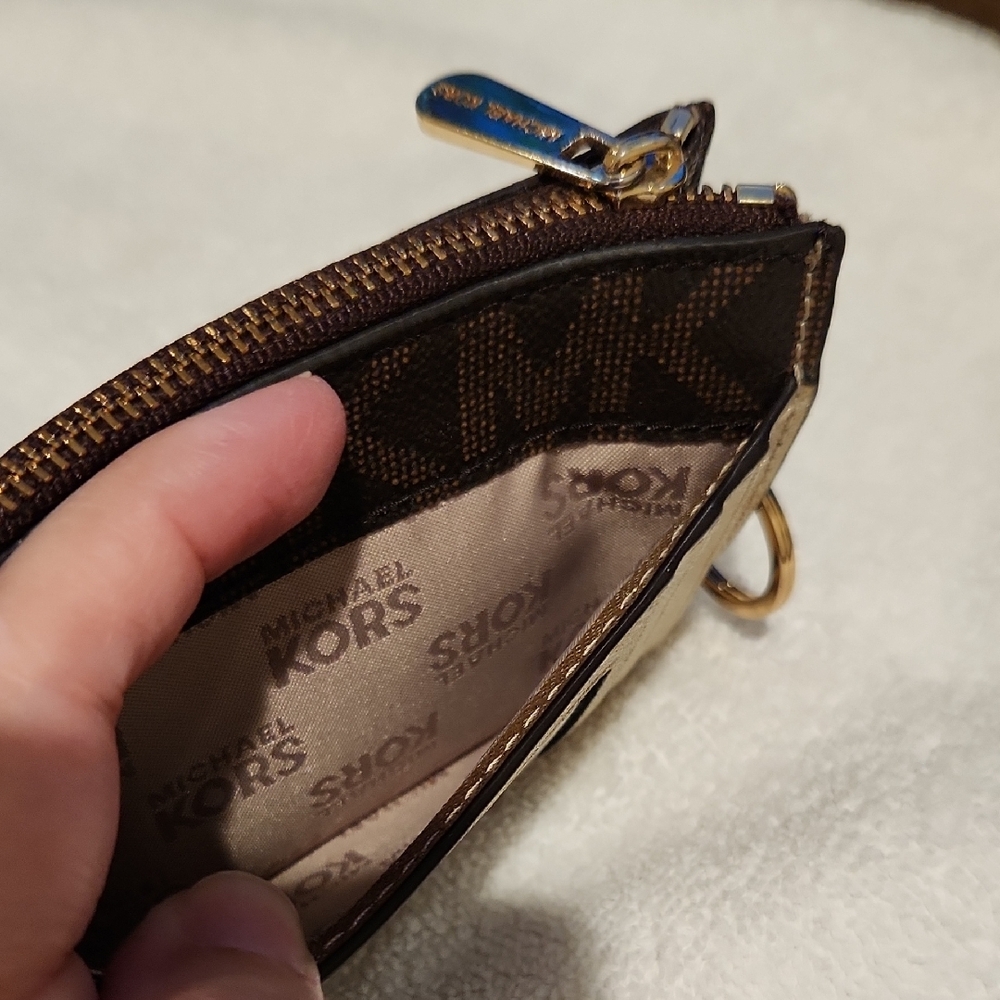 Michael Kors Black Wristlet with Rocket and Star Design - Picture 3 of 7